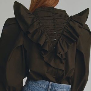 Ruffle poplin shirt.